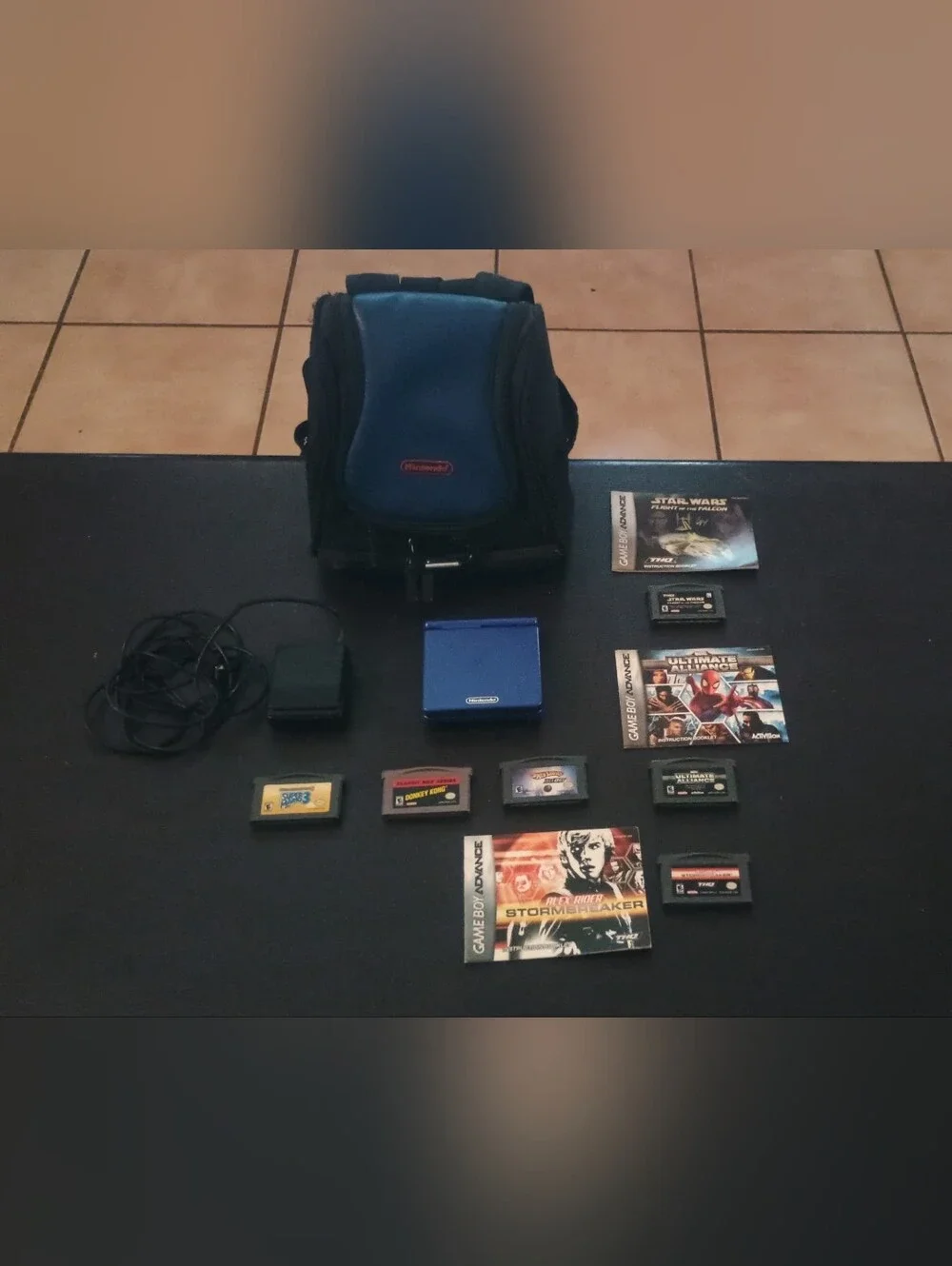 Nintendo Blue Game Boy Advance SP with 6 Games and Carry Case